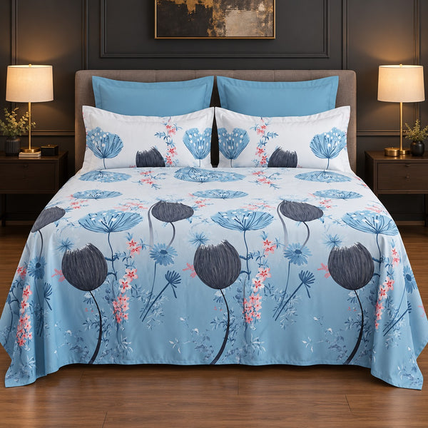 Whimsy Weave Blue Meadow Print Bedsheet Set on a bed