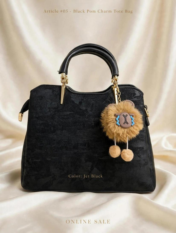 article 05 black pom charm tote bag