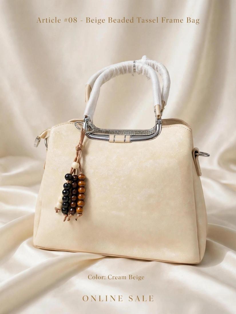 article 08 beige beaded tassel frame bag