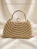 article 02 gold pearl dome clutch