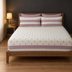 Whimsy Weave Mauve Polka Dot Print Bedsheet Set King Fitted sheet on a bed