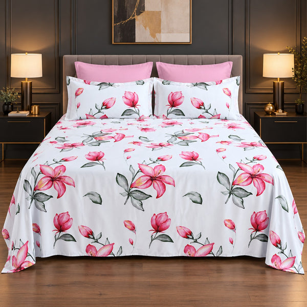 Whimsy Weave Pink Lily Print Bedsheet Set on a bed