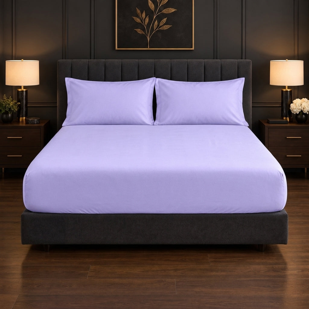 Whimsy Weave Premium Plain Bedsheet Set - Lilac King Fitted sheet on a bed