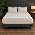 Whimsy Weave Premium Plain Bedsheet Set - Off White King Fitted sheet on a bed