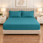 Whimsy Weave Premium Plain Bedsheet Set - Teal King Fitted sheet on a bed