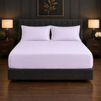 Whimsy Weave Premium Plain Bedsheet Set - White King Fitted sheet on a bed