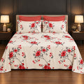 Whimsy Weave Red Blossom Print Bedsheet Set on a bed