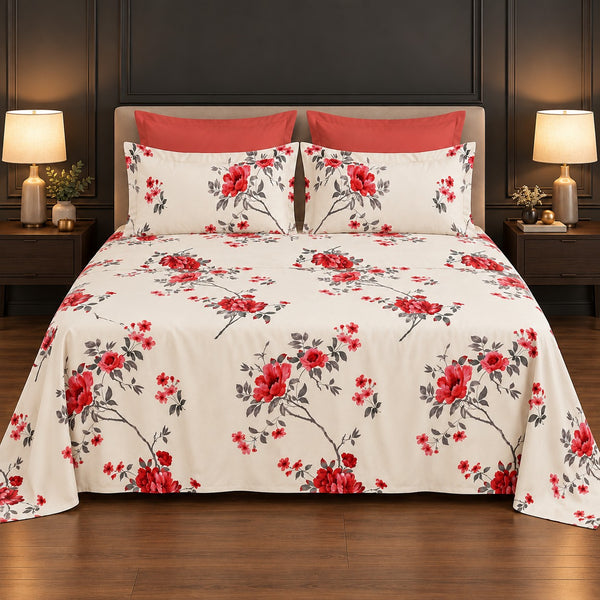 Whimsy Weave Red Blossom Print Bedsheet Set on a bed