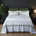 Whimsy Weave Sage Stripe Print Bedsheet Set on a bed