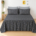 Whimsy Weave Starry Night Print Bedsheet Set on a bed