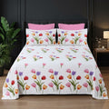 Whimsy Weave Tulip Garden Print Bedsheet Set on a bed